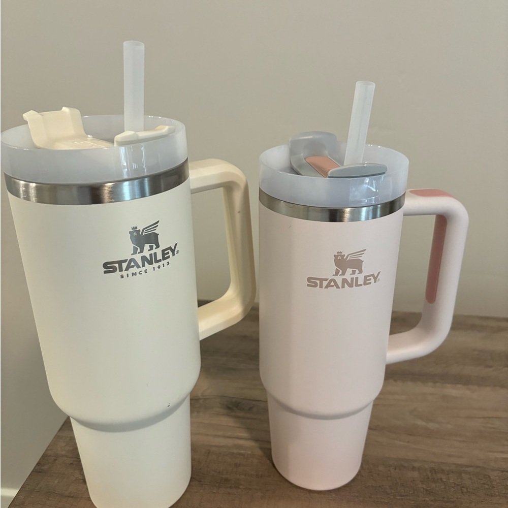 White 40oz Stanley and light pink 30 oz Stanley